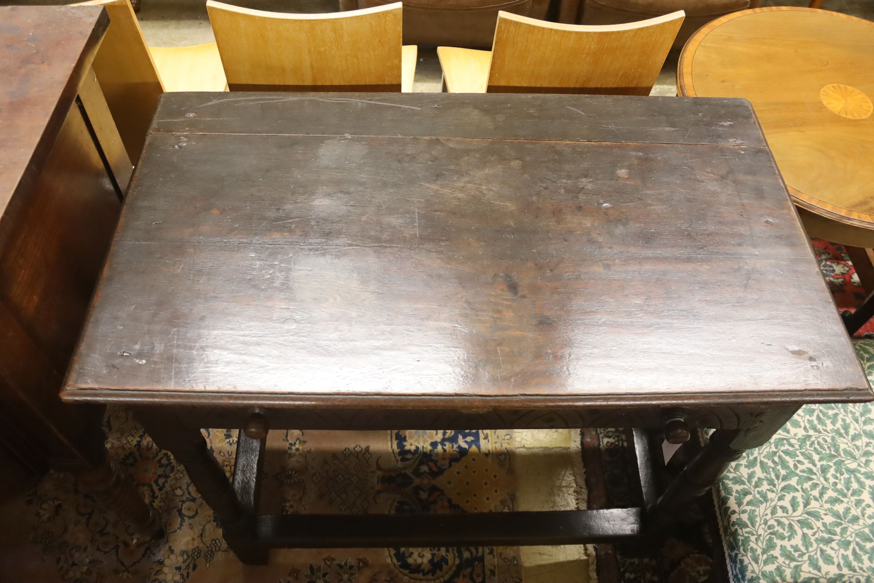 A 17th century oak side table, width 99cm, depth 55cm, height 80cm